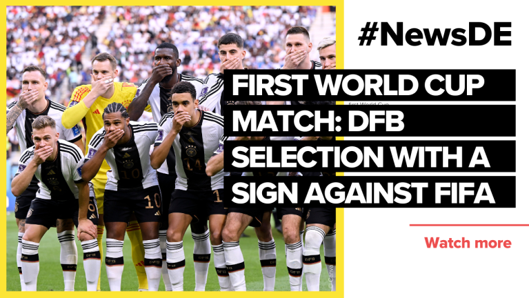 First World Cup match: DFB selection with a sign against FIFA